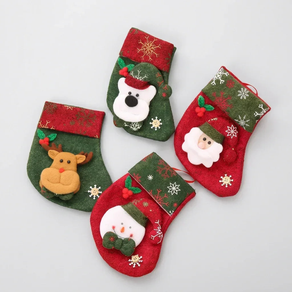 Set of four festive knitted Christmas stockings featuring Santa, snowman, reindeer, and panda.
