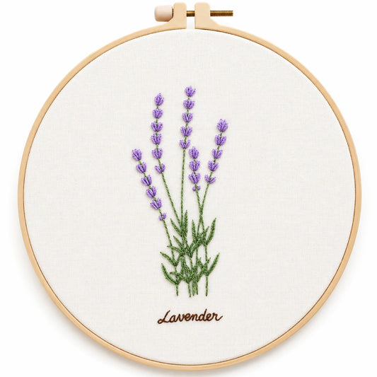 Handmade lavender flower embroidery in a wooden hoop on white fabric.