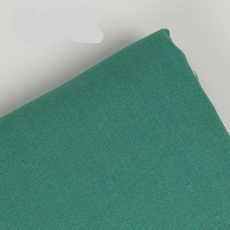 Teal green cotton linen embroidery fabric texture by Calivra Craft