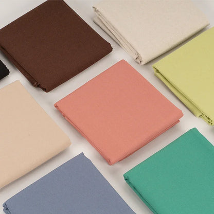 Assorted colorful Calivra Craft cotton linen embroidery fabric swatches.