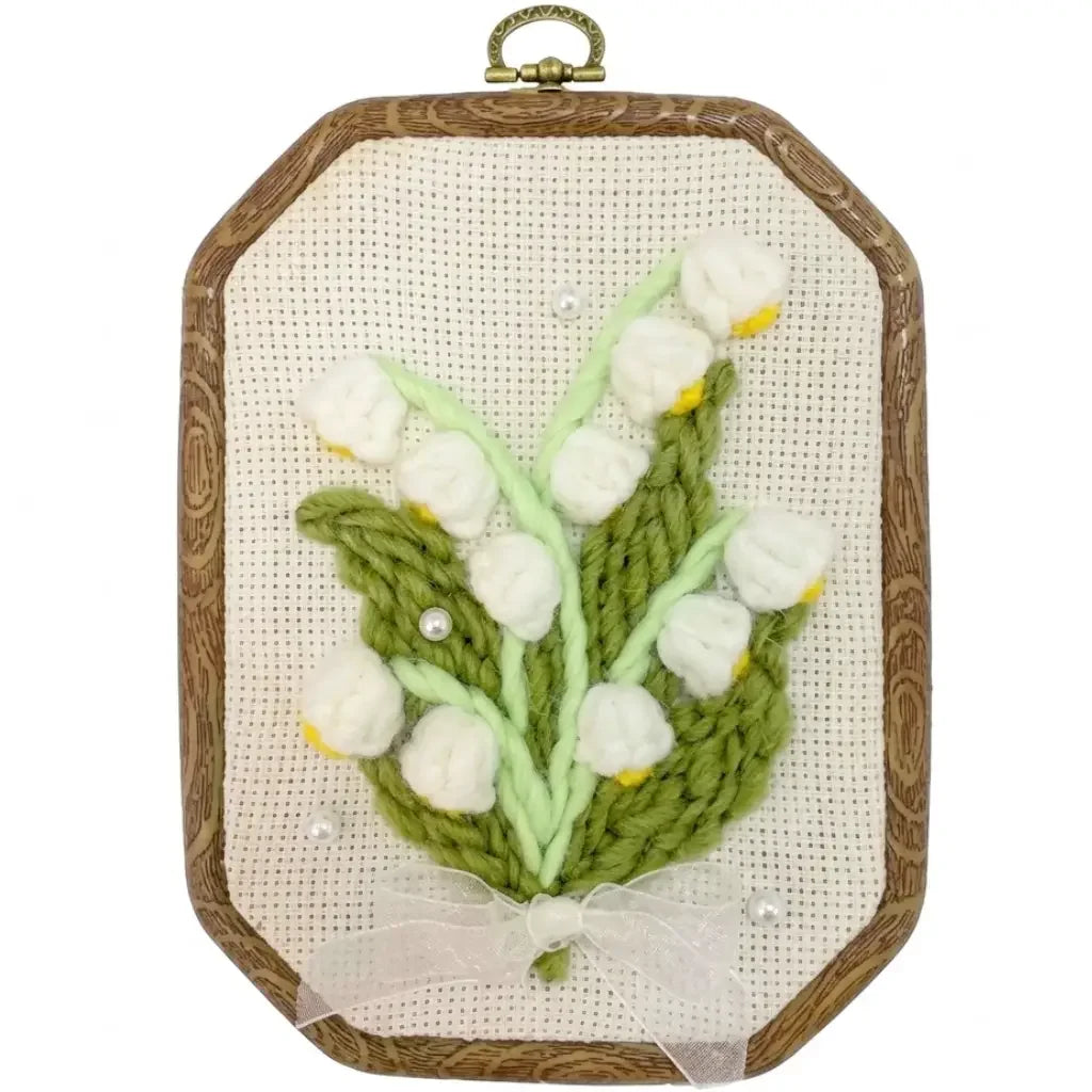 Calivra Craft DIY punch needle embroidery kit featuring 3D white lily of the valley flowers