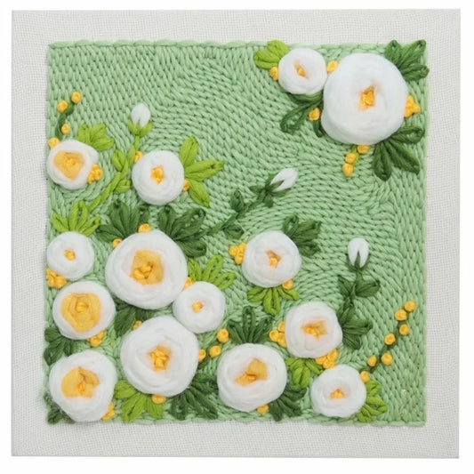 Calivra Craft Flower DIY Punch Needle Embroidery Kit with white floral design on green fabric
