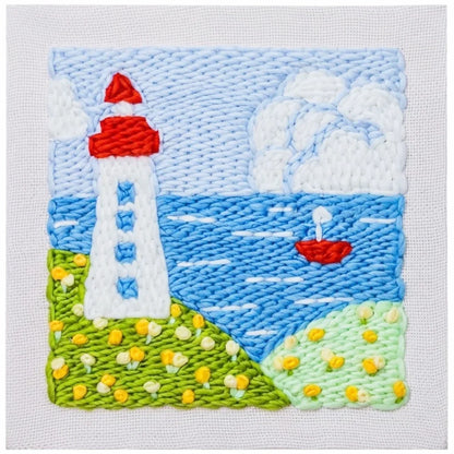 Calivra Craft DIY embroidery kit featuring a lighthouse and boat seascape design