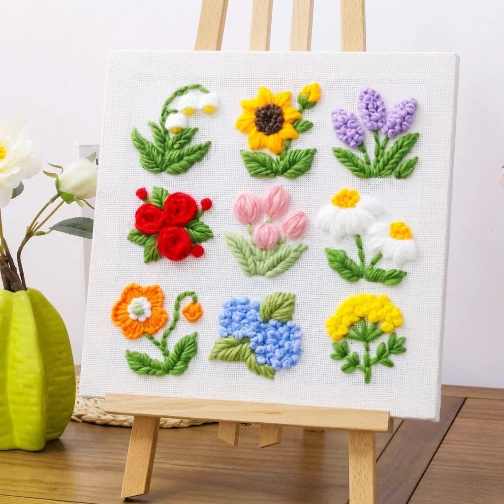 Punch needle flower kit featuring colorful embroidered floral patterns on canvas.