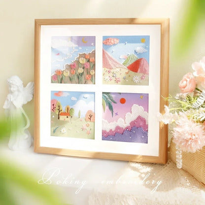Four landscape DIY embroidery painting kits in a wooden frame featuring floral and nature scenes.
