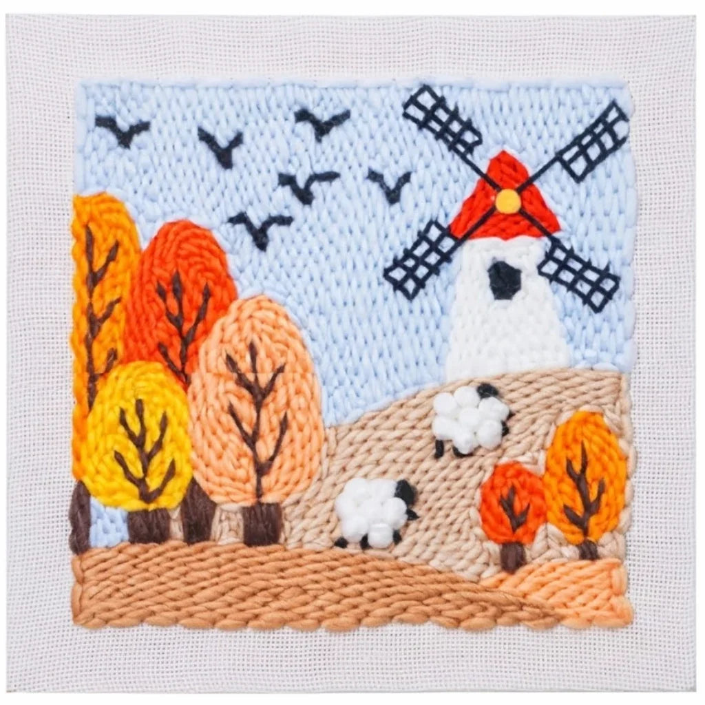 Calivra Craft DIY embroidery kit featuring a windmill, autumn trees, and sheep.
