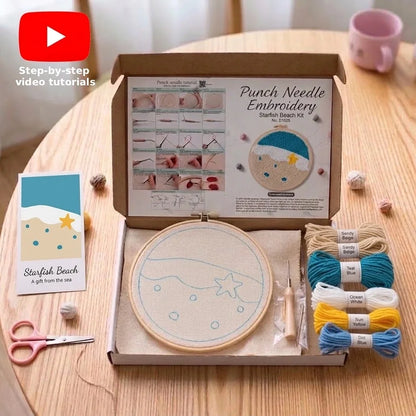 Starfish Beach punch needle embroidery kit with thread, scissors, and embroidery hoop.