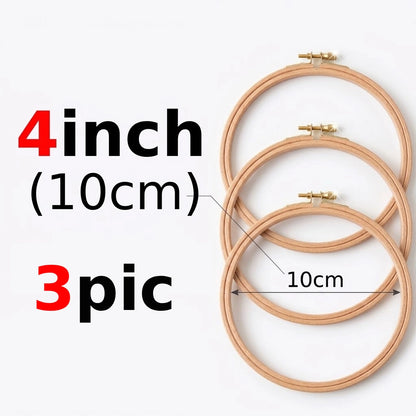 Pack of three 4-inch (10cm) round wooden embroidery hoops for crafting.