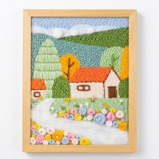 Sunny Cottage Punch Needle Kit by Calivra Craft featuring a colorful landscape art piece.