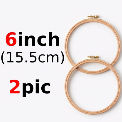 Two 6-inch wooden embroidery hoops by Calivra Craft