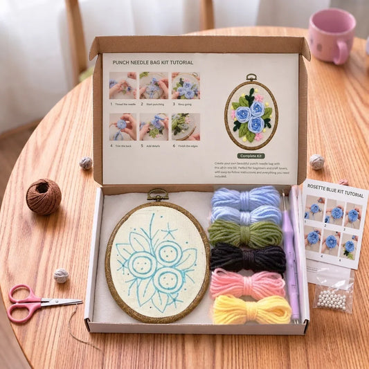 Flower DIY punch needle embroidery kit with yarn, embroidery hoop, and tutorial instructions.