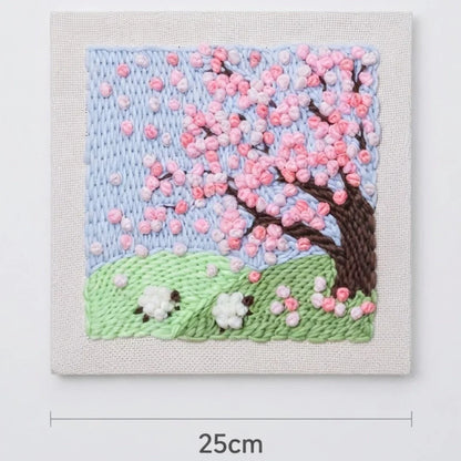 Calivra Craft DIY embroidery kit featuring a textured cherry blossom tree and green landscape.