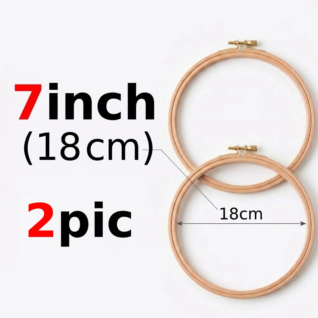 Two 7 inch (18cm) round wooden embroidery hoops for crafting.
