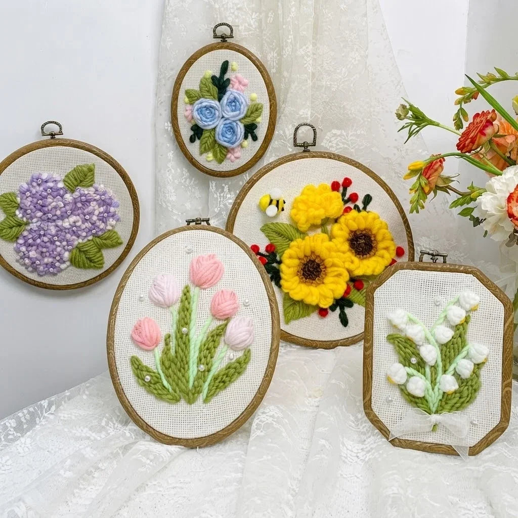 Four Calivra Craft DIY punch needle embroidery kits featuring colorful floral designs.