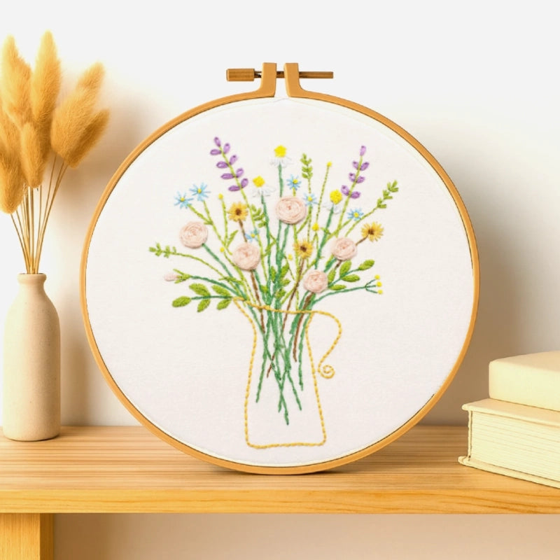 mbroidery Kit captures the quiet charm of a fresh morning — a vase filled with pastel flowers in soft shades of pink, lavender, yellow, and blue.
Every stitch brings a sense of calm, like sunlight filtering through your window.