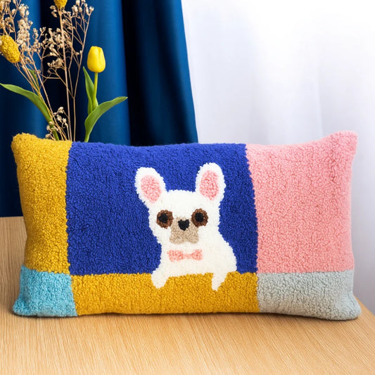 A puppy with a pink bow sits in the center against a colorful block background, simple yet full of playful charm