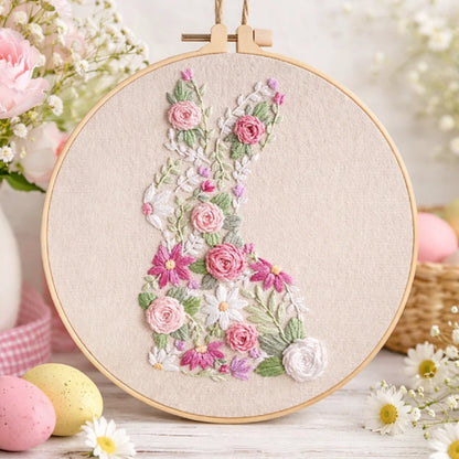 Embroidery hoop with floral design on a light background