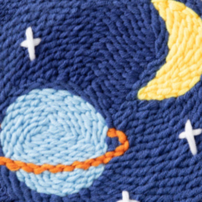Embroidered design of planets, moon, and stars on a blue background