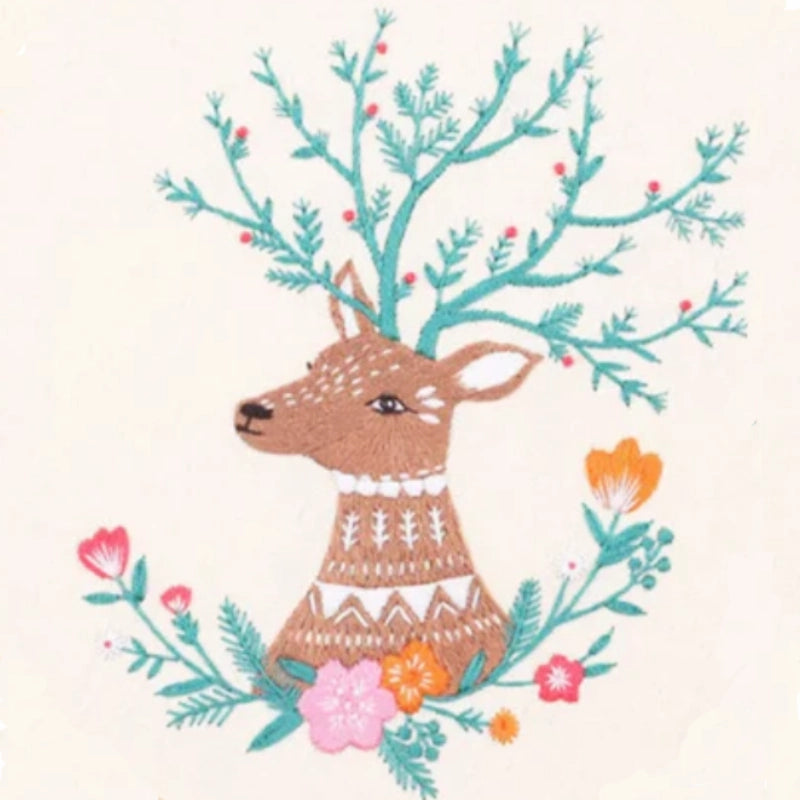 Forest Guardian captures the gentle beauty of nature through an elegant deer adorned with branch-like antlers and surrounded by blooming flowers. The blend of earthy browns, soft pinks, and vibrant oranges creates a harmonious and cozy feel.