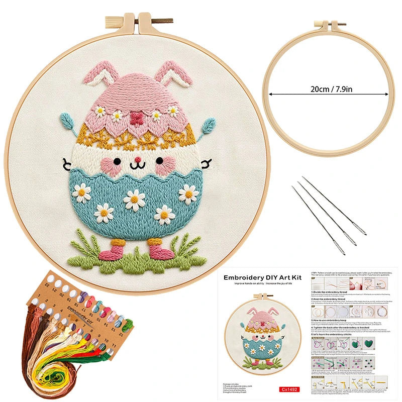 This adorable embroidery kit features a cheerful egg character with bunny ears and a bright, pastel-colored design. Surrounded by sweet daisies and soft grass, it brings a playful and joyful atmosphere to your spring décor. With its charming details and vibrant stitching, this DIY kit offers a fun and creative way to celebrate Easter and the beauty of the season.
