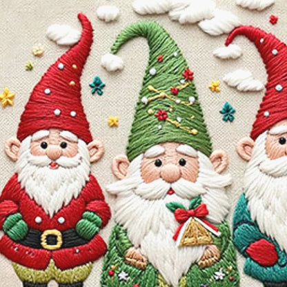 Three embroidered gnomes with red, green, and multicolored hats on a textured fabric background.
