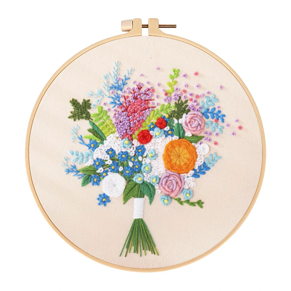 Embroidery hoop with a colorful floral bouquet design on a white background