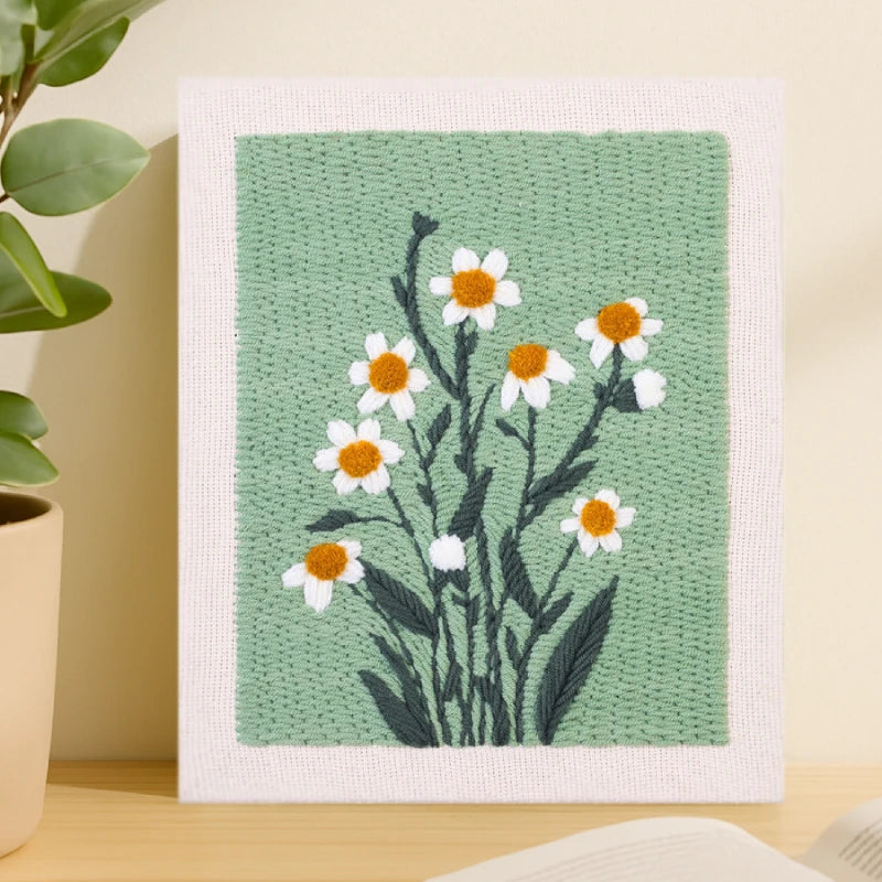 This artwork features delicate white daisies blooming against a soft green background, with warm yellow-orange centers and deep green leaves creating a fresh, natural, and lively look.