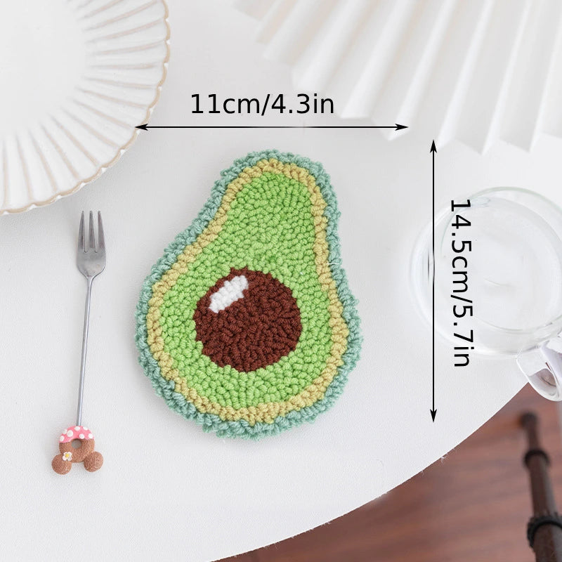 Avocado-shaped placemat with measurements on a white surface