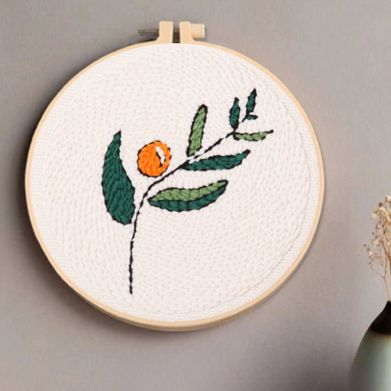 A single branch with green leaves and an orange fruit sways gently, as if dancing in the breeze.