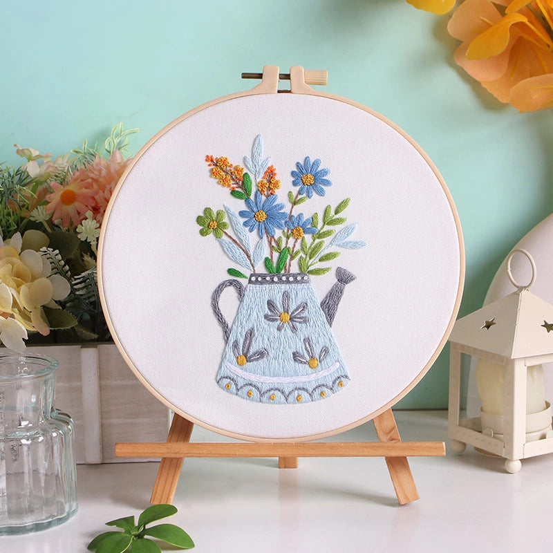 Morning Dew reflects the freshness of a new day — soft blue petals kissed by light, blooming from a gentle grey-blue watering can. This design evokes calmness and renewal, perfect for bringing a serene, natural touch to your space.