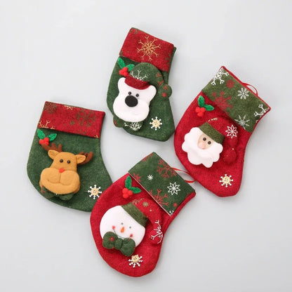 Set of four festive knitted Christmas stockings featuring Santa, snowman, reindeer, and panda.