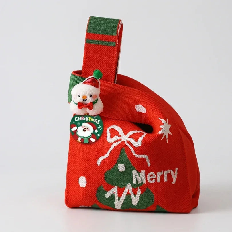 Red knitted Christmas gift bag with snowman charm and Merry Christmas design by Calivra Craft