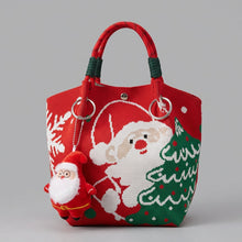Red Calivra Craft Christmas tote bag featuring a Santa Claus design and plush Santa charm.