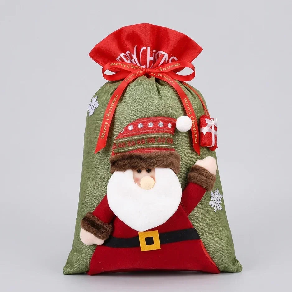Santa Claus themed Christmas gift bag with red ribbon and snowflake patterns.