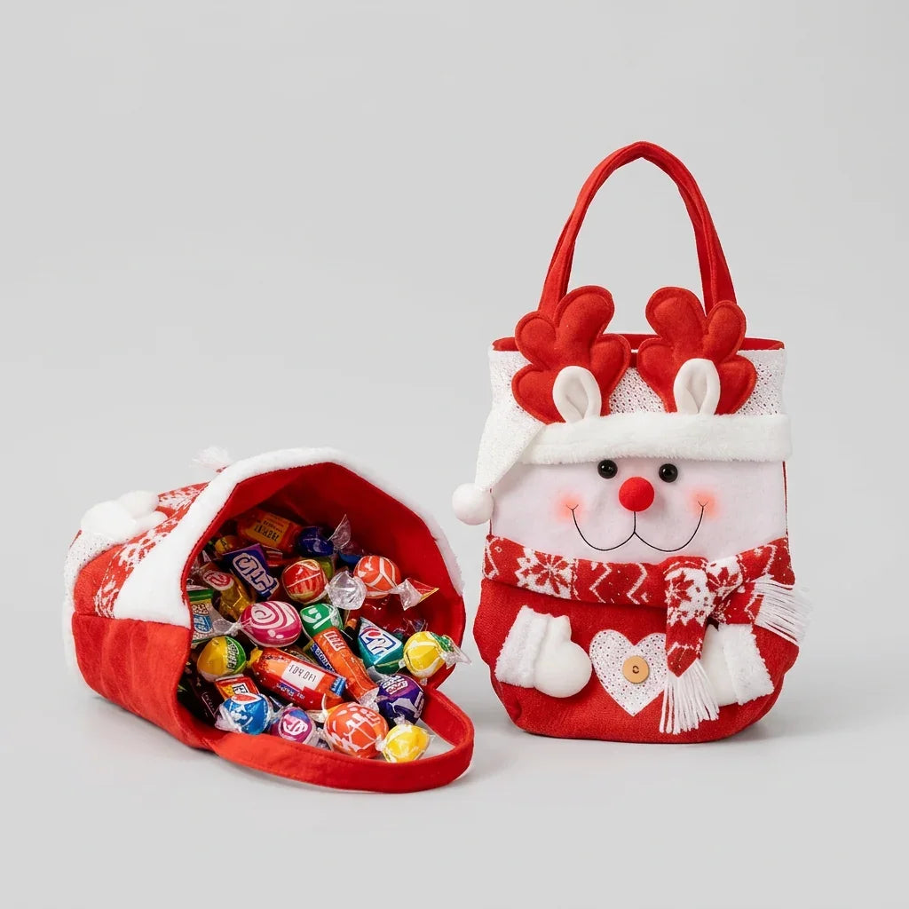 Santa Christmas gift bag and knitted reindeer apple pouch filled with colorful candies.