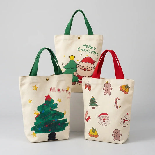 Three festive Christmas canvas gift bag storage totes with holiday illustrations.