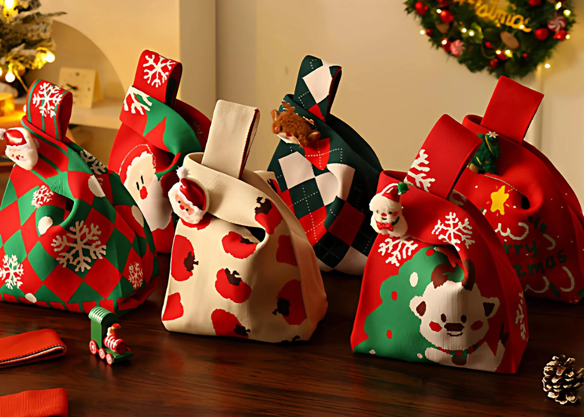 Assorted Calivra Craft Christmas knitted gift bags with festive patterns and plush charms.