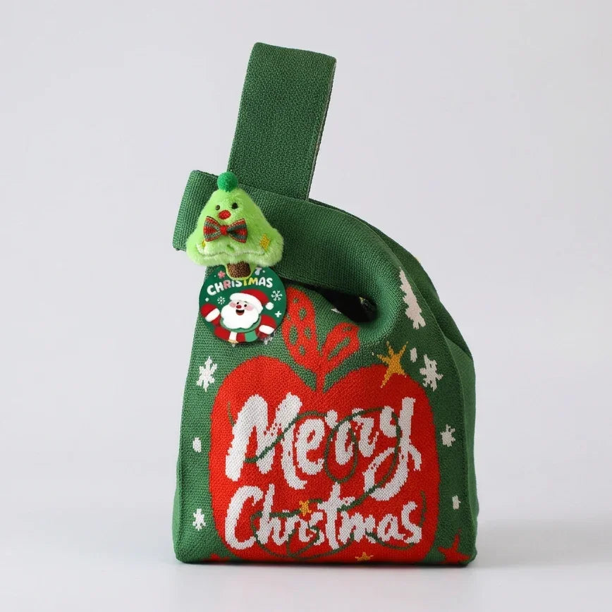 Calivra Craft green knitted Christmas gift bag with red apple design and tree charm