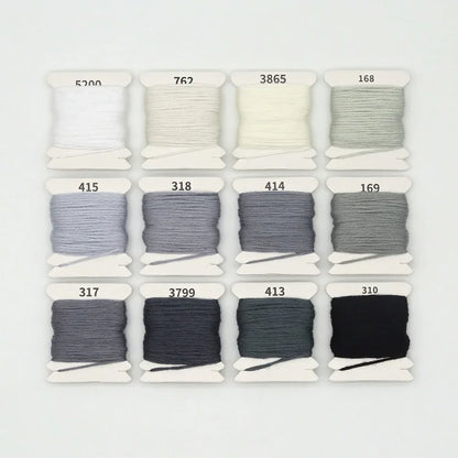 12 shades of gradient grey and white 6-strand cotton embroidery floss skeins.