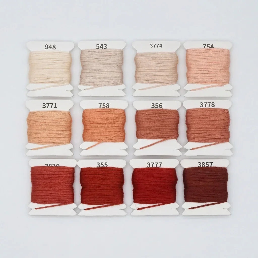 12-color gradient 6-strand cotton embroidery floss set in earthy tones.