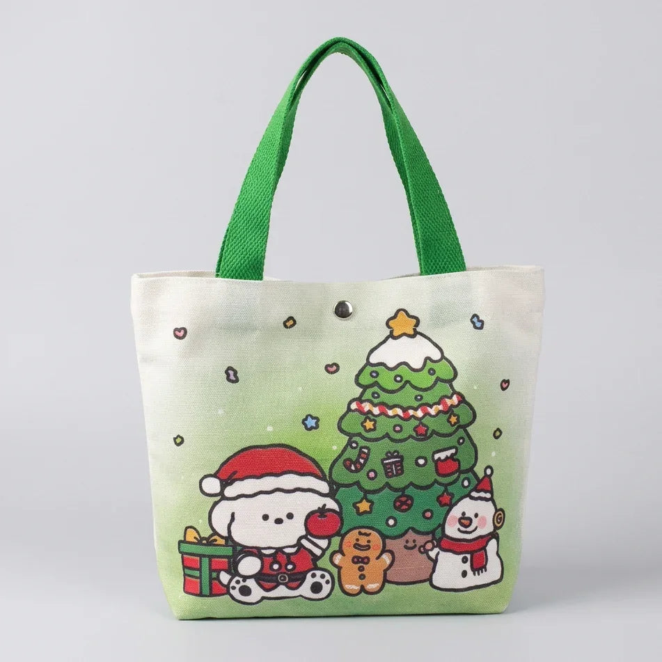 Christmas canvas gift bag featuring a cute cartoon snowman, gingerbread man, and decorated tree.