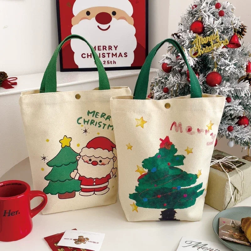 Two Calivra Craft Christmas canvas gift bags with Santa and tree illustrations.