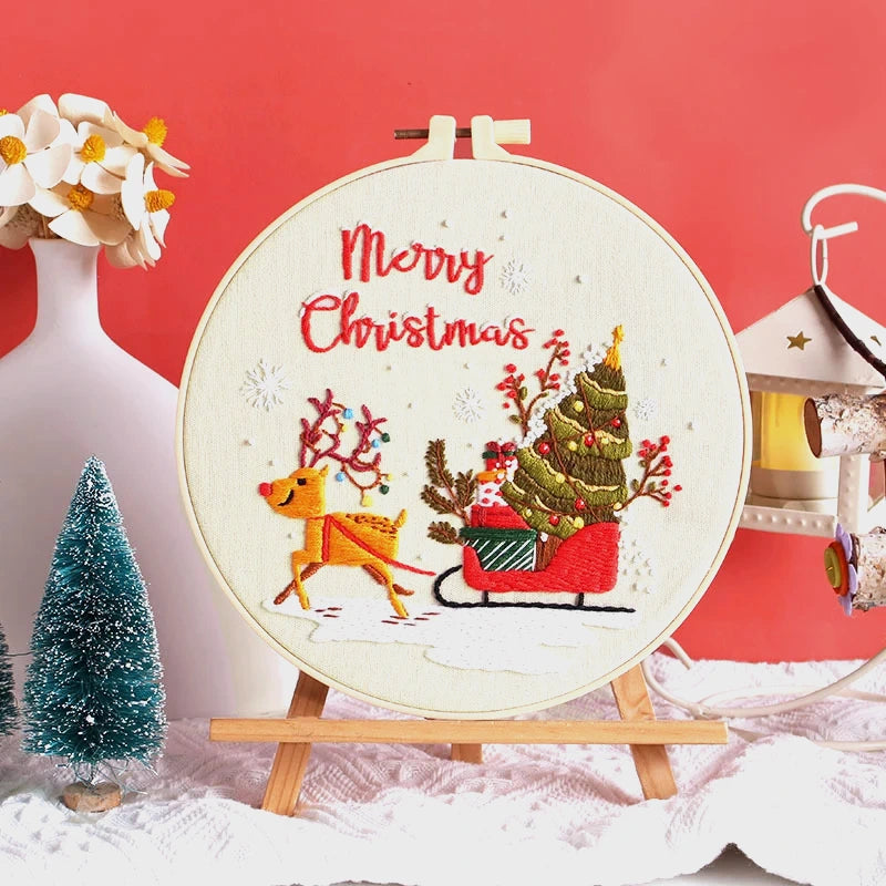 This beautiful embroidery design features a festive reindeer pulling a sleigh filled with gifts and a Christmas tree, racing through the snowy night to spread holiday cheer. The detailed stitching and vibrant colours bring the scene to life, making it perfect for Christmas home décor, creative crafting, or as a thoughtful handmade gift for loved ones.