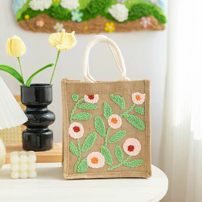 Soft pink petals with warm coral centers and fresh green leaves create a gentle, cheerful pattern — just like spring flowers swaying in the breeze.