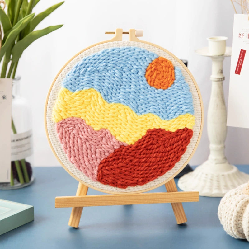 Colorful knitted wall art on a wooden stand with a blurred background