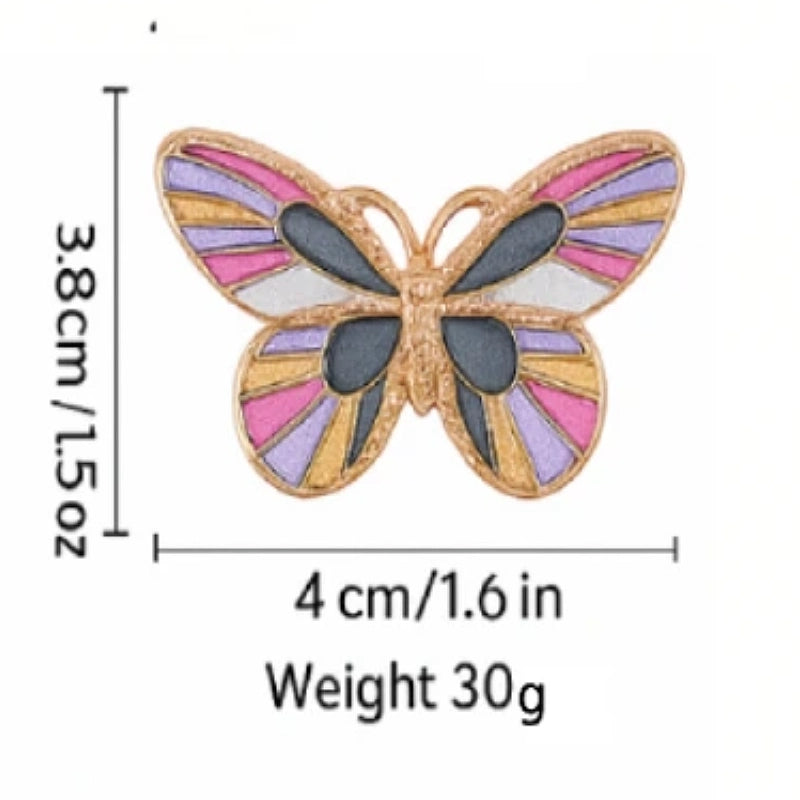 Butterfly-shaped object with dimensions and weight on a white background