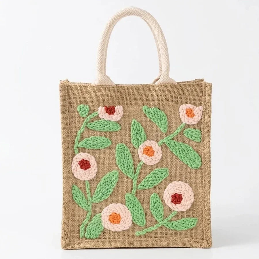 Small jute tote bag with colorful floral embroidery