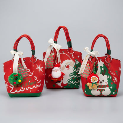 Three festive red Christmas tote bags with Santa, snowman, and holiday patterns for gifts.
