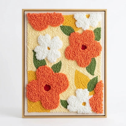 Calivra Craft Bright Blossoms punch needle art with orange and white flowers in a gold frame
