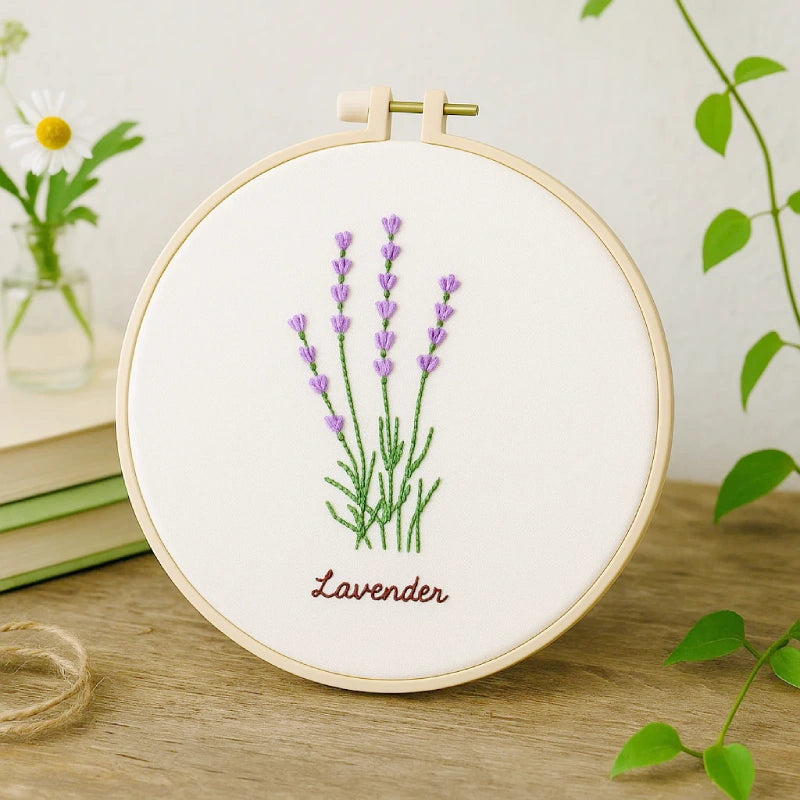 Embroidery hoop with lavender design on a wooden surface